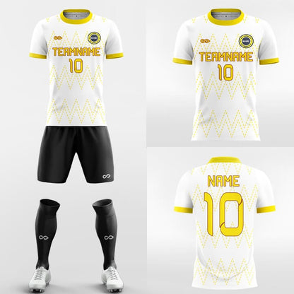 white and yellow short sleeve volleyball uniform